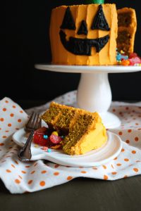 slice of pumpkin cake with candy on plate