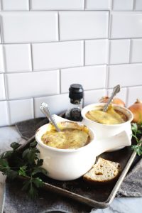 two bowls of soup on table