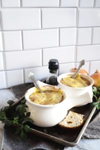 two bowls of soup on table