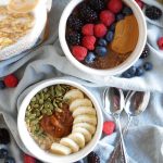 overhead shot of two decorated bowls of oatmeal