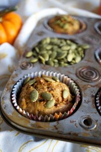 pumpkin muffin inside muffin tin