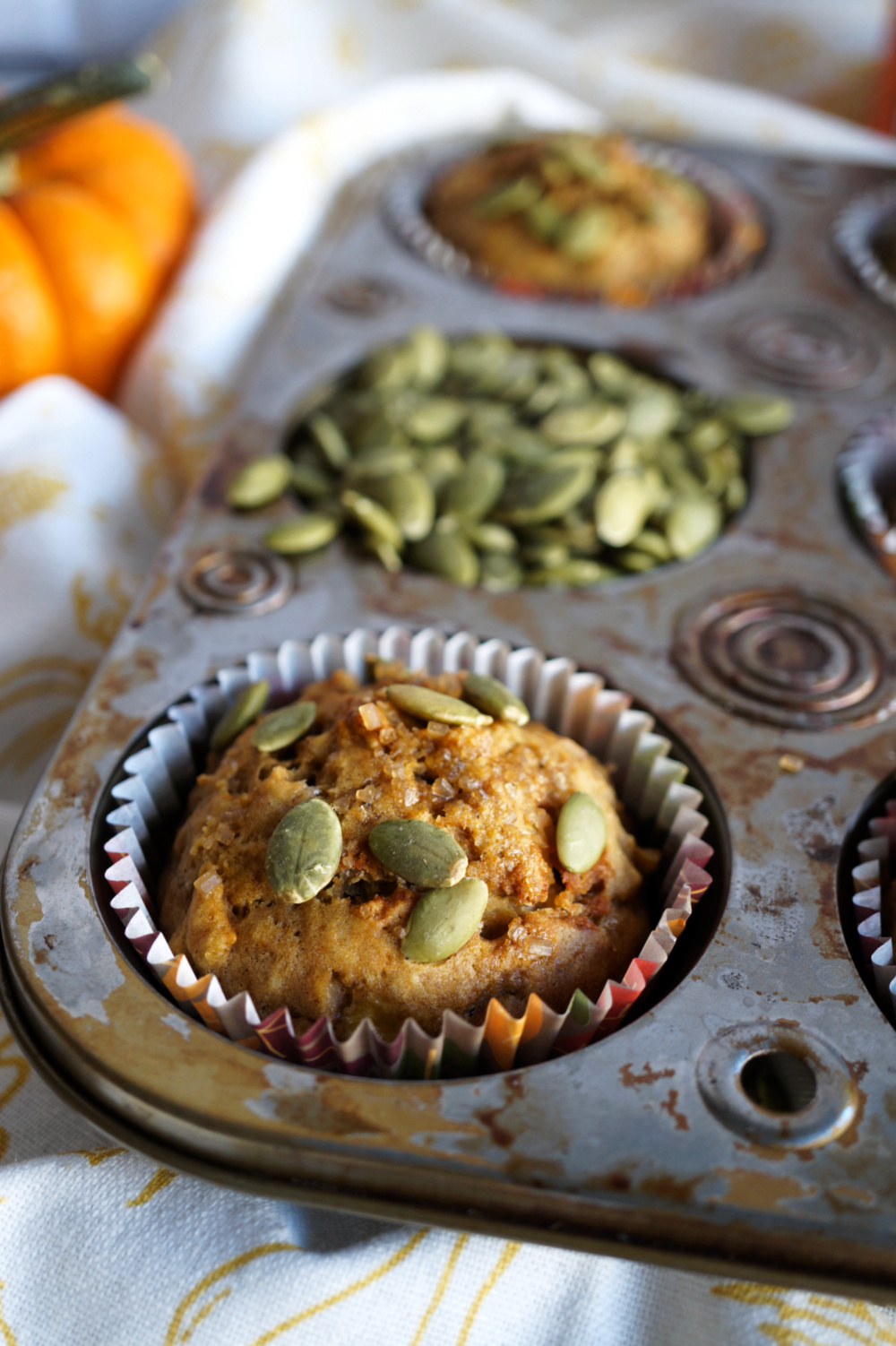 pumpkin muffin inside muffin tin