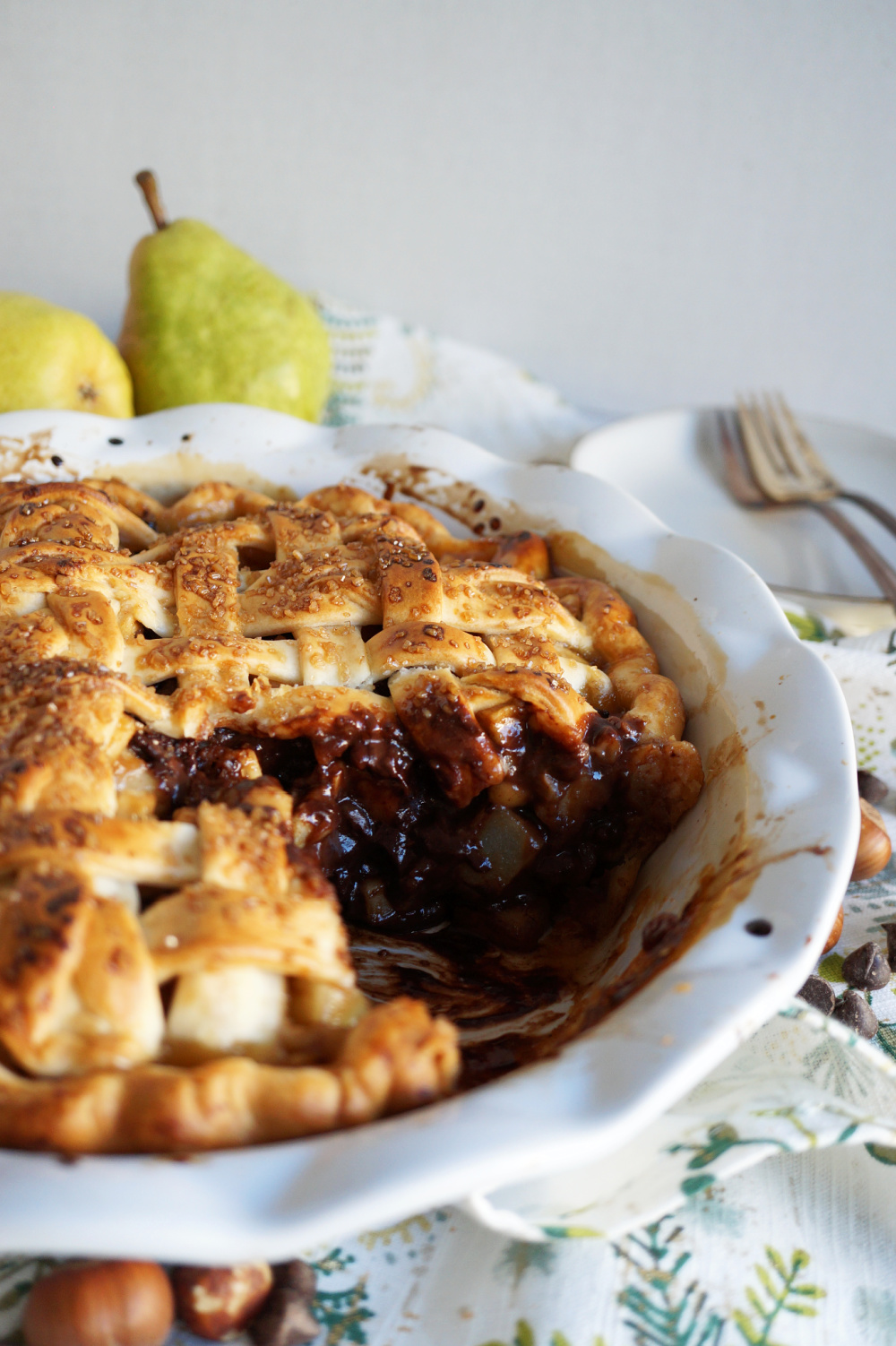 sliced hazelnut pear pie in plate