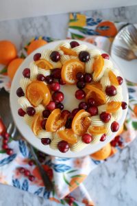 overhead shot of frosted cranberry clementine cake