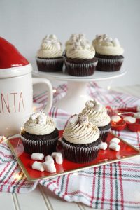 hot cocoa cupcakes on red tray
