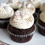 hot cocoa cupcakes on cake stand