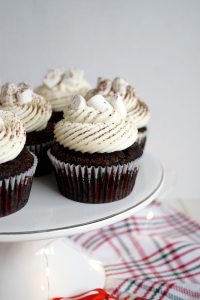 close up of cupcake on cake stand