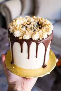 small peanut butter cake with chocolate drip