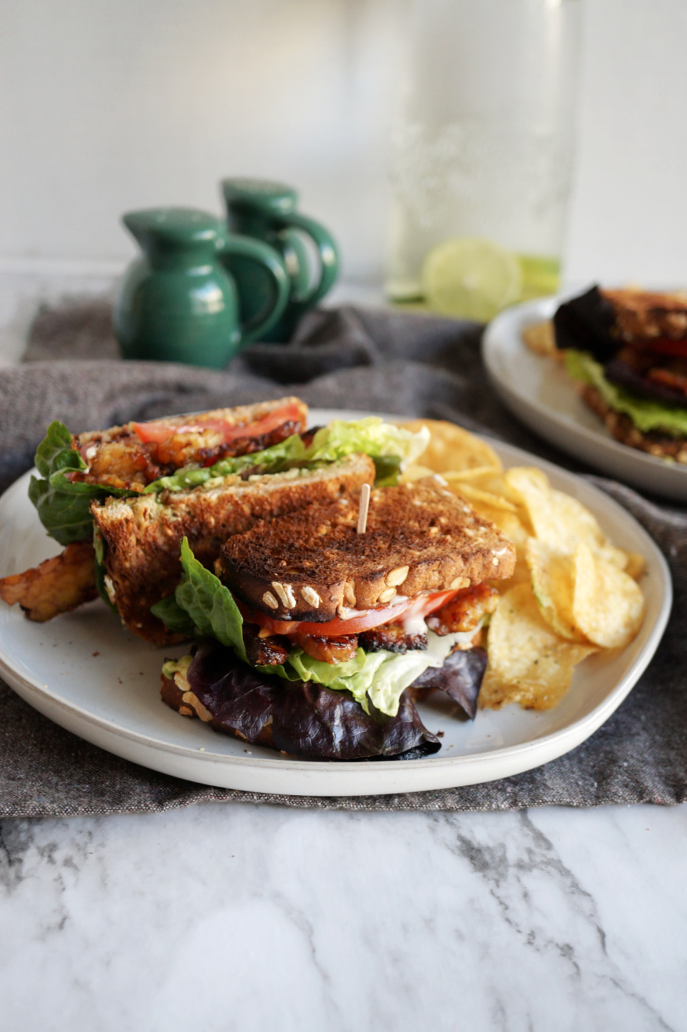 sandwich cut in half on plate