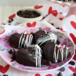 chocolate covered cake gems on pink plate