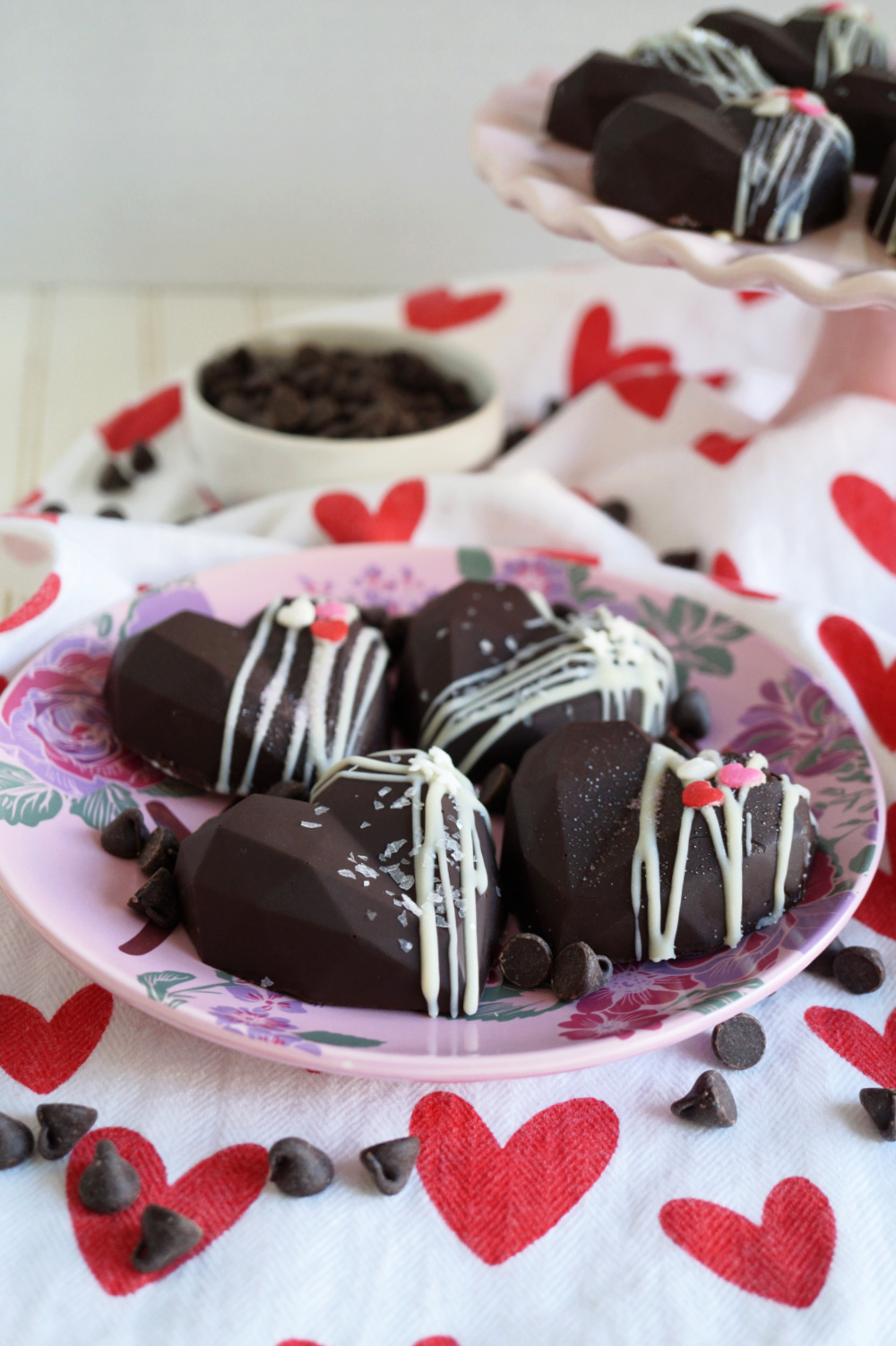chocolate covered cake gems on pink plate