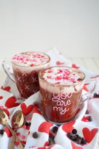 angled glass cups of red velvet hot cocoa