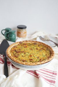 broccoli ham and cheese quiche on platter