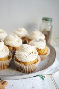 carrot cake cupcake with a swoop of frosting