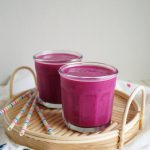 two cups of pink pitaya smoothie