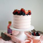 wild berry cake on stand