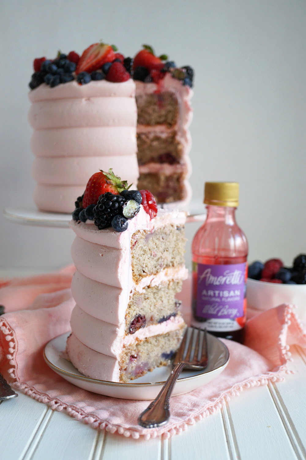 wild berry cake slice on plate