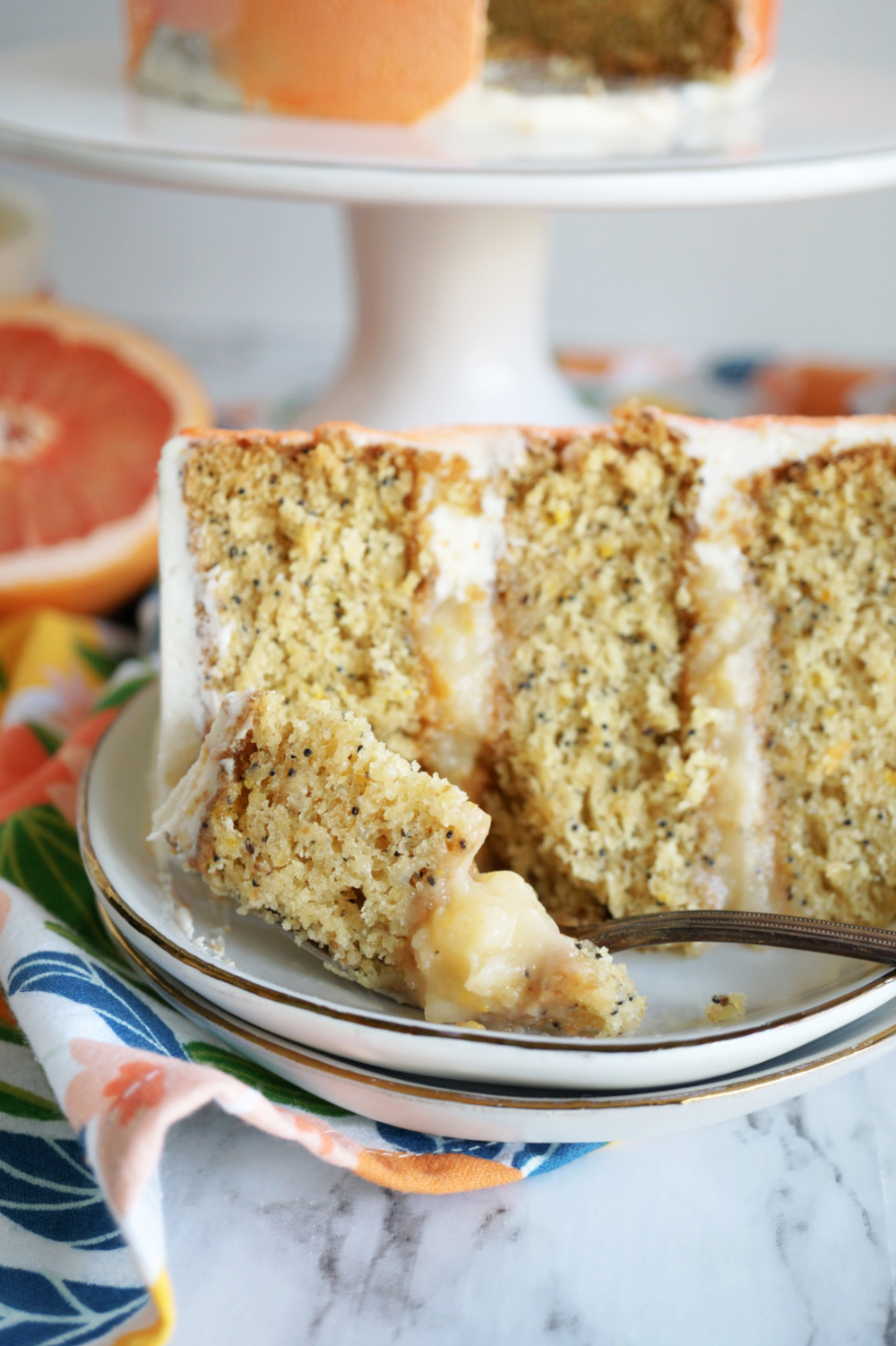 grapefruit cake slice on plate