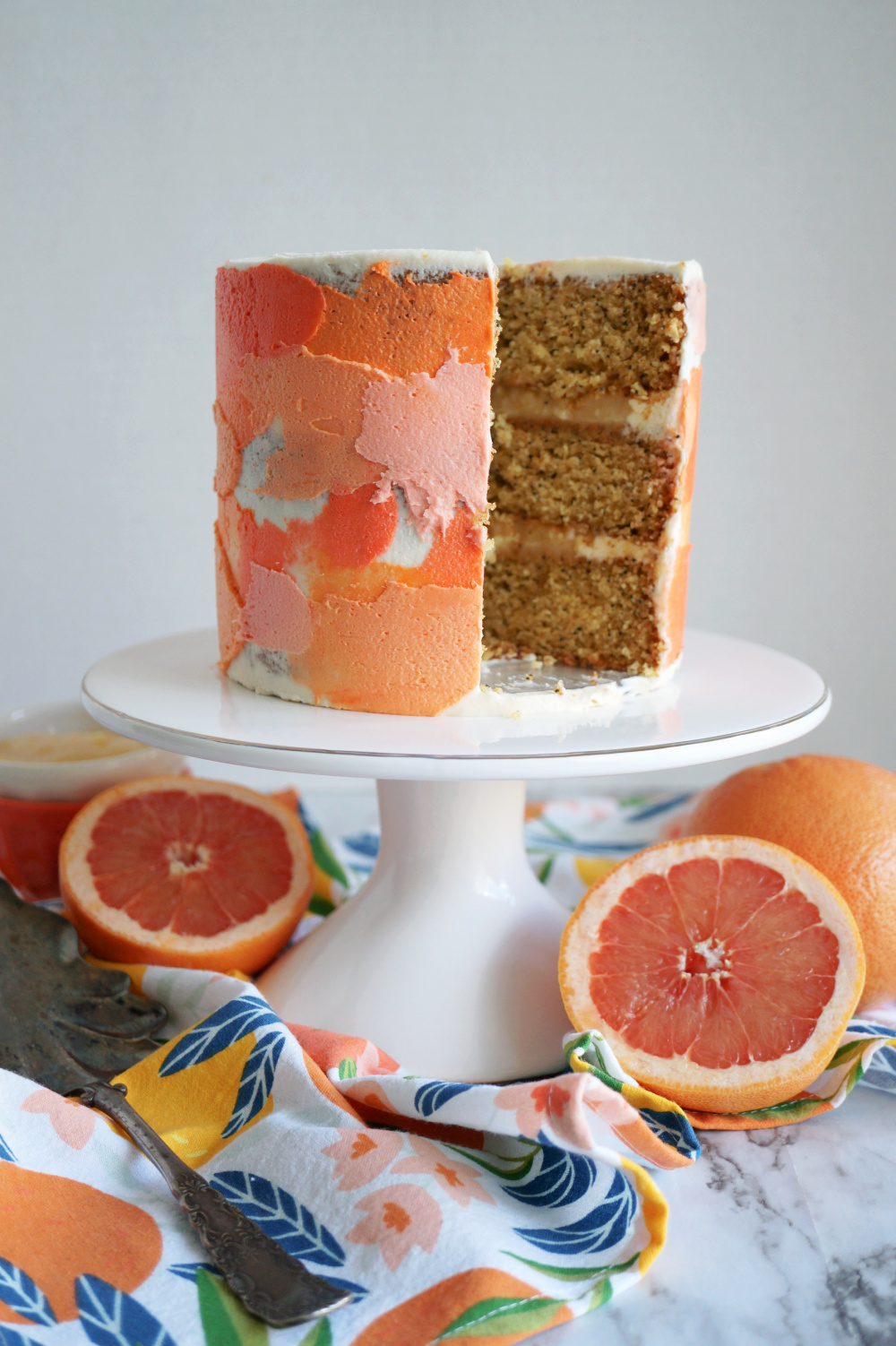 grapefruit cake with slice cut out