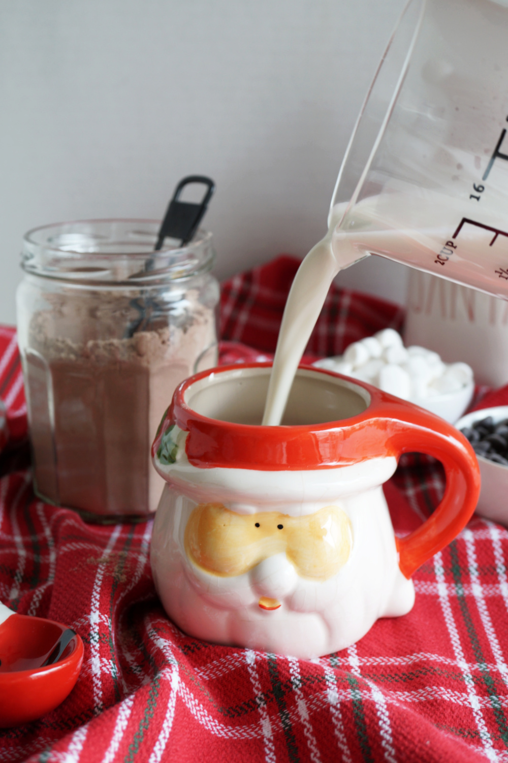 pouring milk into mug