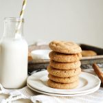 stack of snickerdoodle cookies on white plate